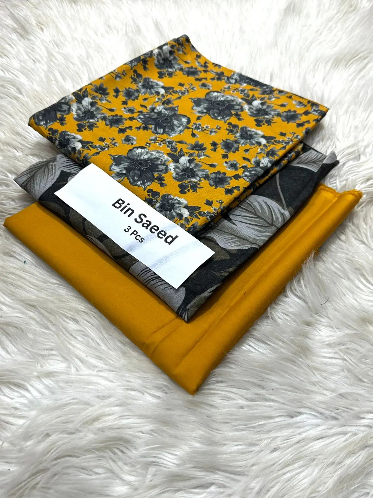 Bin Saeed 3-Piece Lawn Suit – Mustard with Black Floral Print Khoobsurat